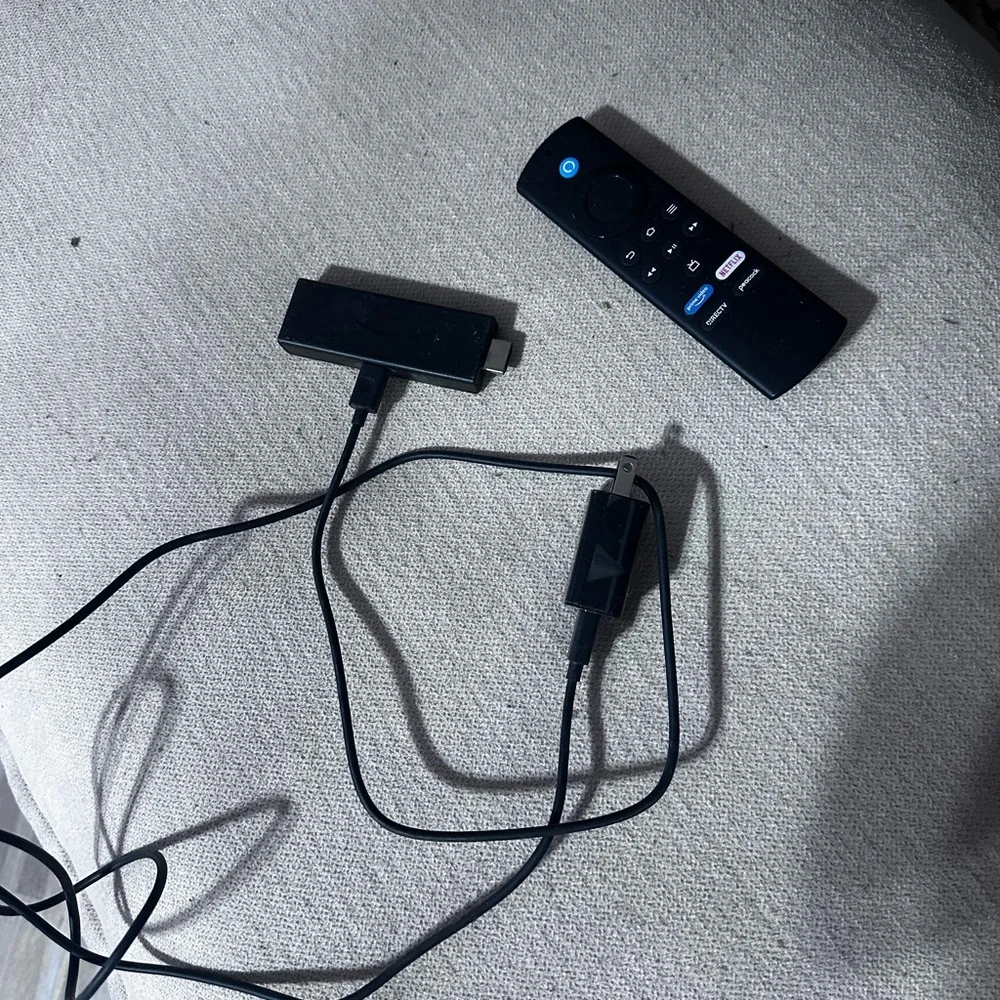Amazon Fire TV Stick with Voice Remote - Black and Blue